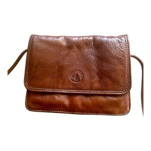 A brown Lupus in Fabula Borgonicchio over shoulder handbag